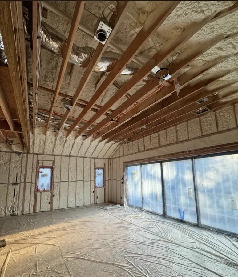 Interior walls and ceiling insulated with spray foam during new construction in Muskogee